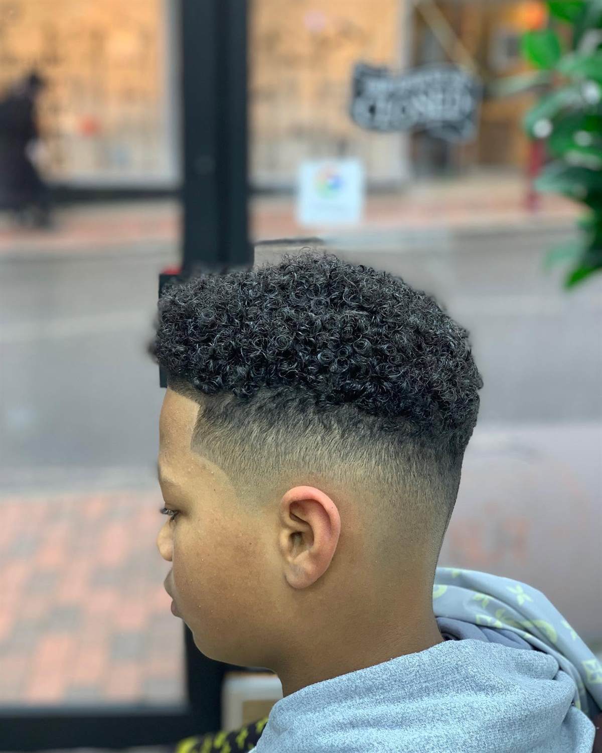 Curly top drop fade at Royal Barbers Tunbridge Wells